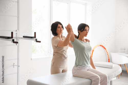 Female physiotherapist work...