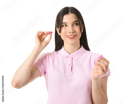 Pretty young woman with pin...