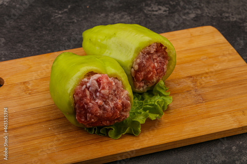 Raw stuffed pepper for cooking