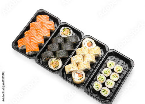 Composition with delicious sushi rolls on white background