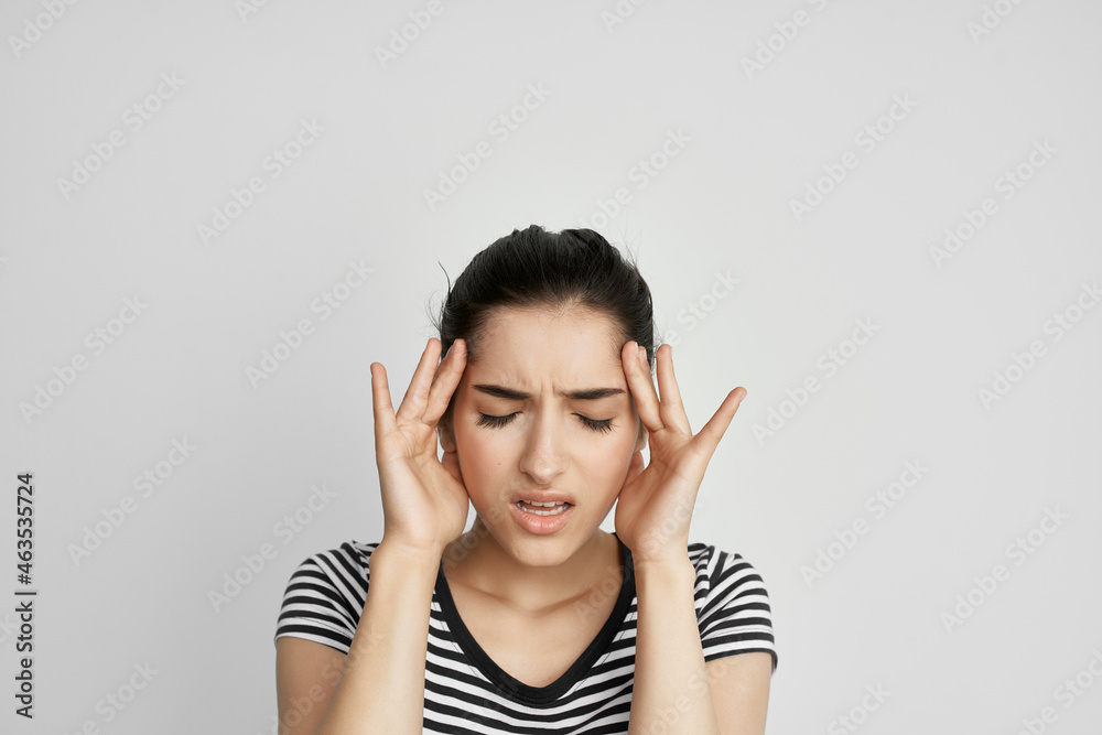 brunette holding his head migraine depression isolated background