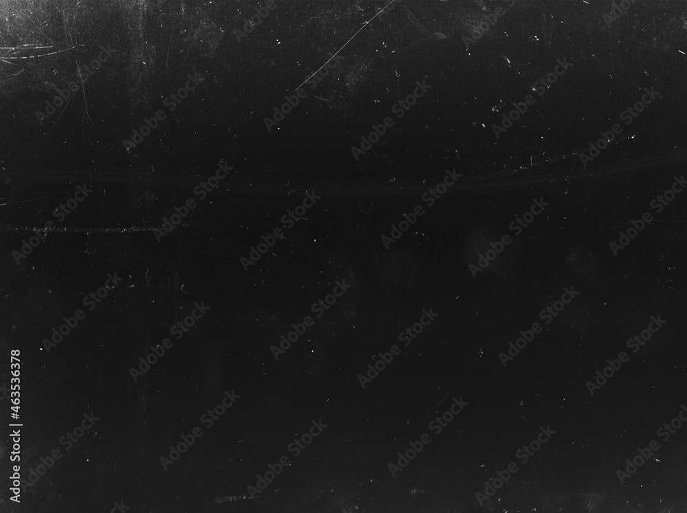 Grunge overlay. Dust scratch texture. Weathered chalkboard surface. Aged dirty black white film with fingerprint ash stains noise mask.