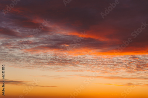 Sunset Cloudy Sky With Clouds. Sunset Sky Natural Background. Dramatic Sky. Sunset In Yellow  Orange  Pink Colors