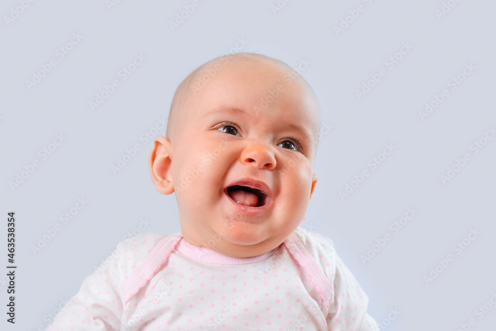 Portrait of a newborn baby with open mouth