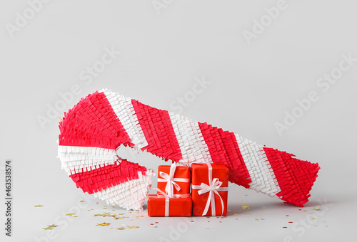 Candy cane pinata with gift...
