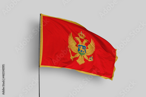 Foto Montenegro flag isolated on the blue sky background
