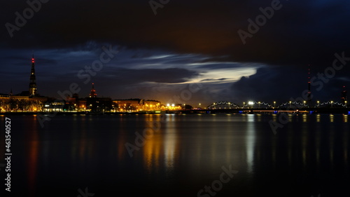 Autumn sunrise in Riga reflection of night lights in the Daugava