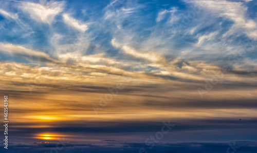 Autumn sunset sky with clouds