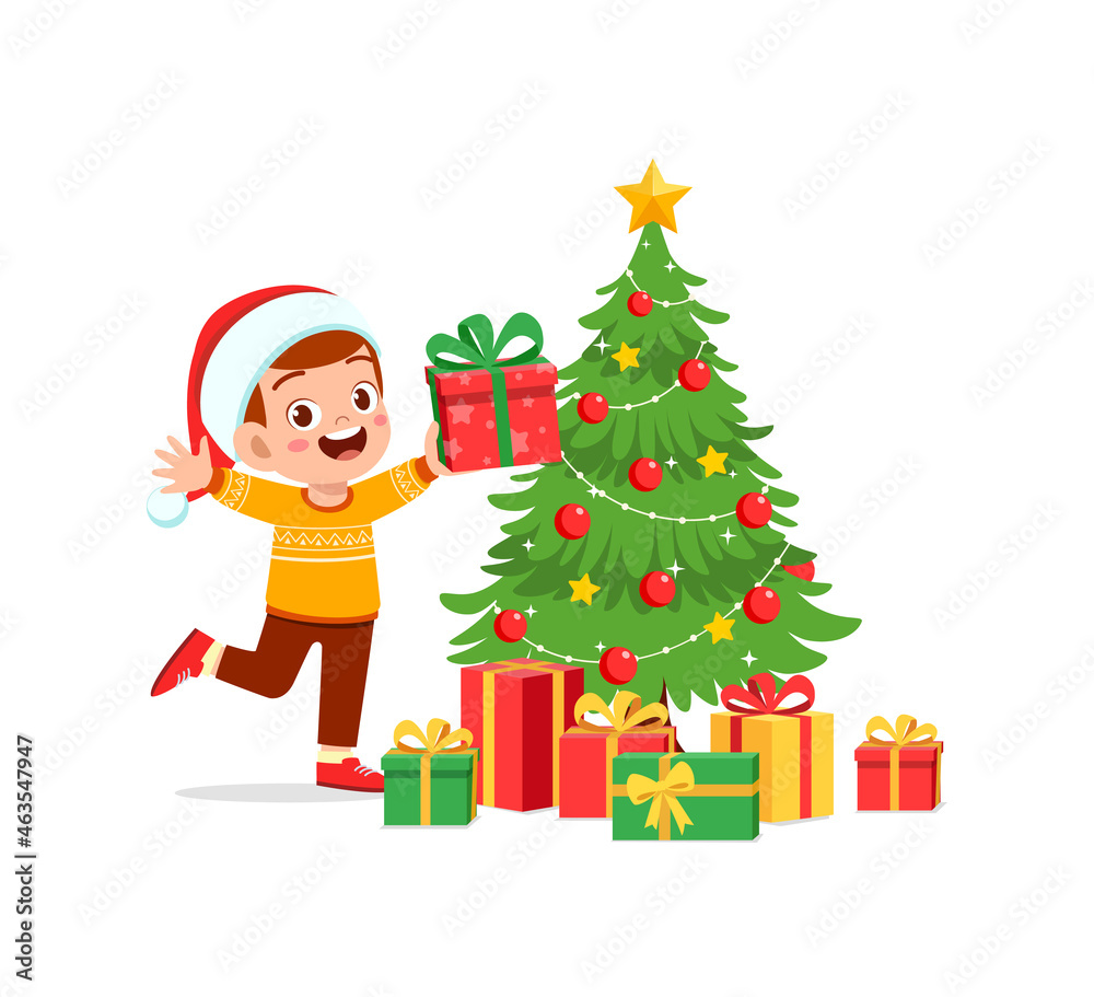 happy little boy holding present for christmas happy little boy holding present for christmas