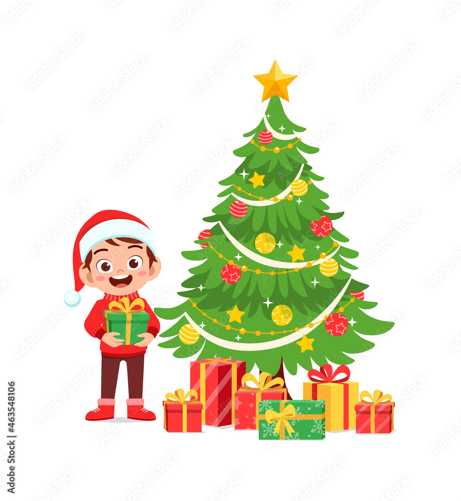 happy little boy holding present for christmas