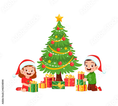 happy little boy and girl holding present for christmas