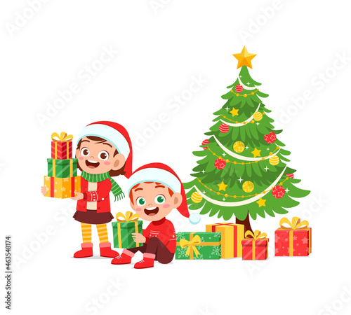 happy little boy and girl holding present for christmas