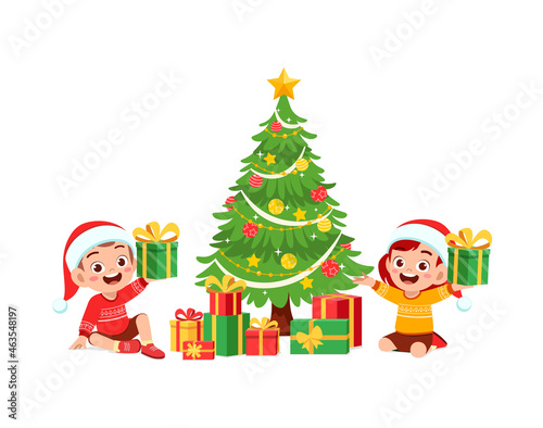 happy little boy and girl holding present for christmas