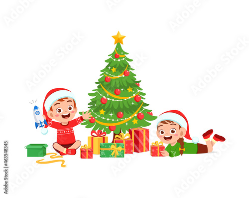 happy little boy and girl holding present for christmas © Colorfuel Studio
