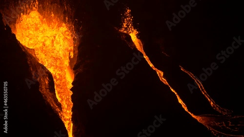 multiple fountains of lava exploding on the big island of hawaii photo