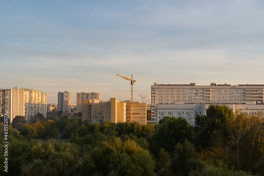 Construction crane at dawn in the sun. Construction crane at dawn in the sun.