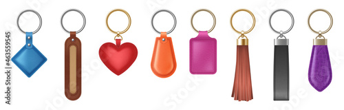 Colorful leather keychain of different shapes with metal golden and silver chain and ring
