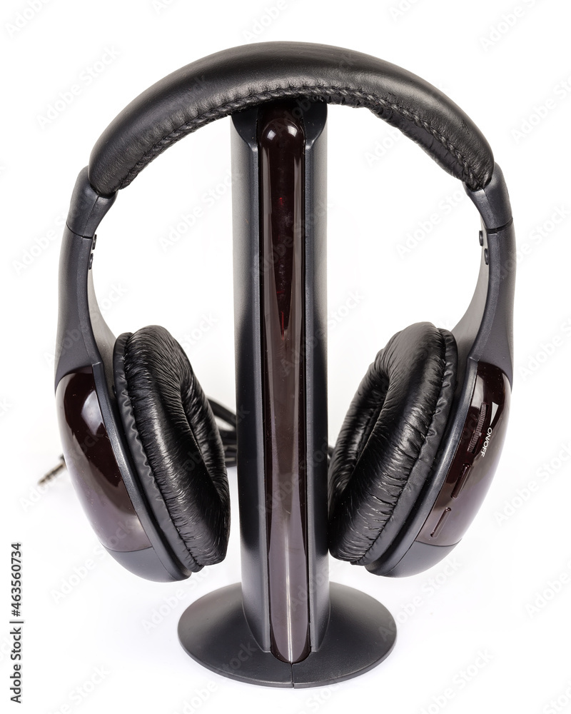 Wireless full size headphones on emitter on a white background Wireless full size headphones on emitter on a white background