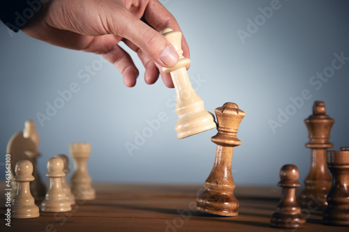 The man is playing chess