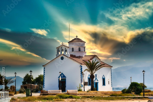 Church of Saint Spyridon in Elafonisos in Greece against a dramatic sky.
 photo