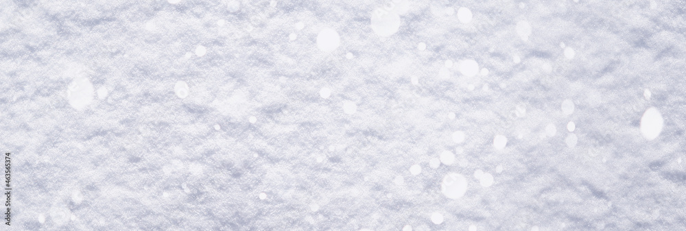 Obraz premium The texture of the snow. Winter rainfall. Tracks on a snowy road after a snowfall.