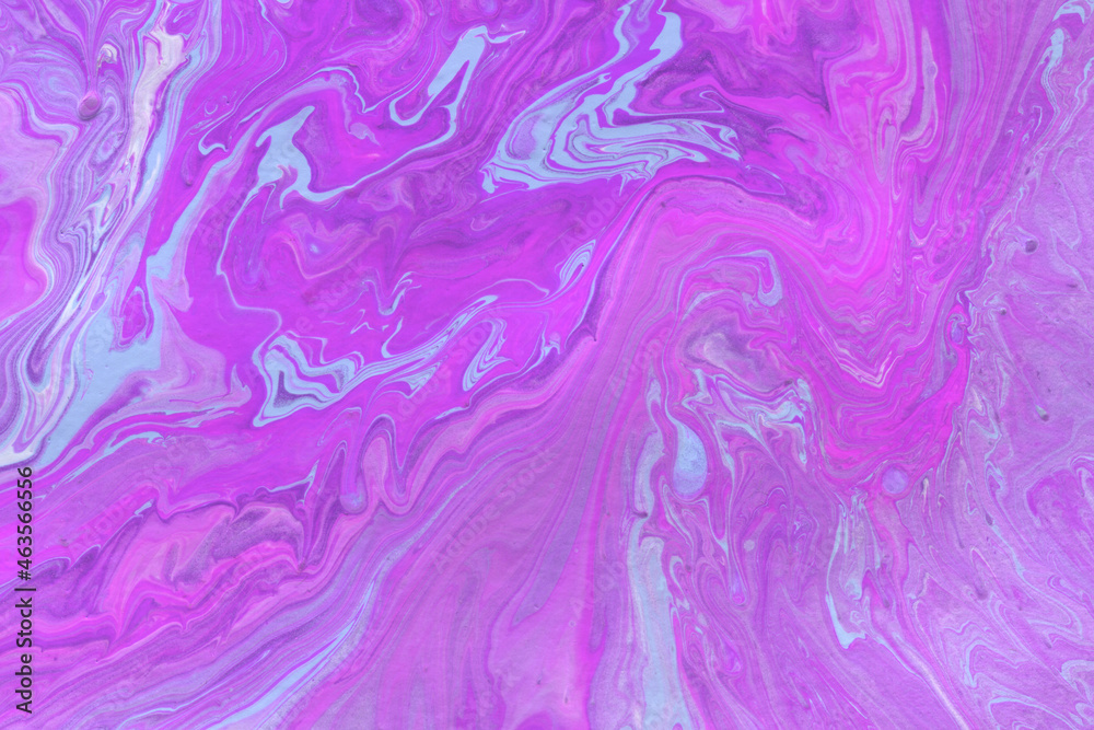Acrylic texture made in liquid pour technique. Background in purple and blue neon colors.
