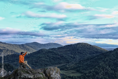 guy mountains sitting  male tourist travel active summer