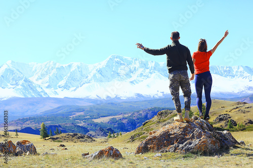 couple hands up mountains, landscape adventure active view
