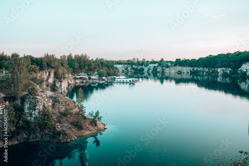 Summer landscape with small lake in forest. Crystal clear water