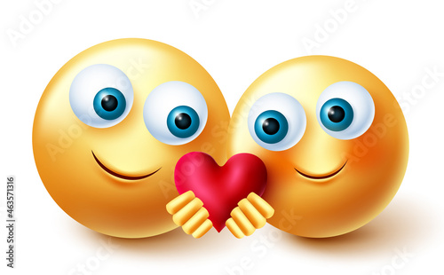 Emoji valentines couple vector design. Smileys 3d inlove emojis concept holding and sharing heart element for romantic love valentine emoticons character. Vector illustration.
