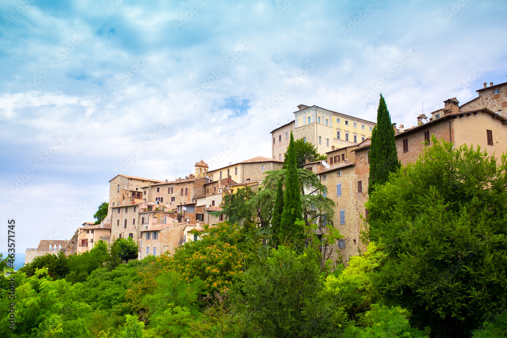 Medieval town Todi on the hill Italy, tourist tourism. Ancient cities of Europe, beautiful landscape panoramic view. Fortifications of medieval Italy.