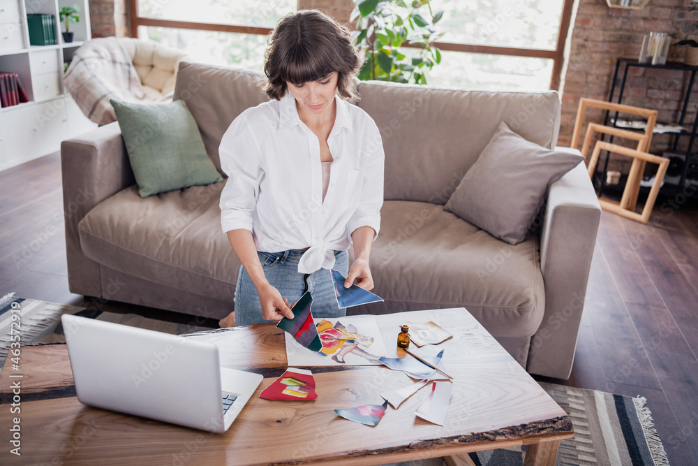 Photo of cute brunette millennial lady do art wear white shirt sit at home alone Photo of cute brunette millennial lady do art wear white shirt sit at home alone