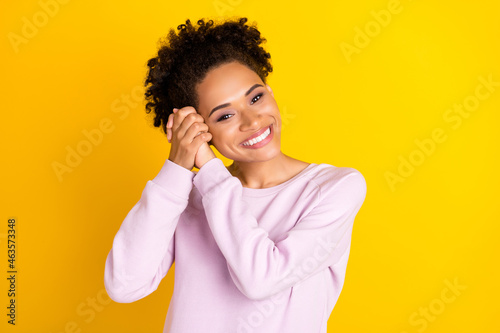 Photos Portrait of pretty cheerful dark skin person arms folded touch head look camera