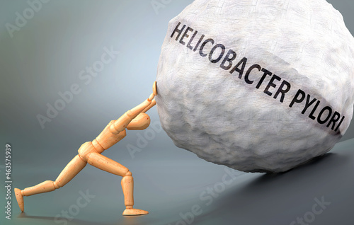 Depiction of Helicobacter pylori shown a wooden model pushing heavy weight to symbolize struggle and pain when dealing with Helicobacter pylori, 3d illustration photo