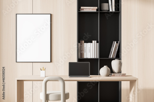 Bright living room interior with empty white poster, desk, laptop © ImageFlow