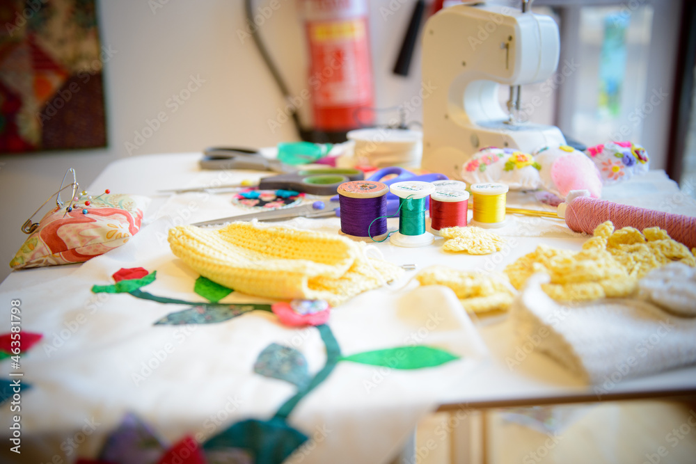 colorful threads on the table background