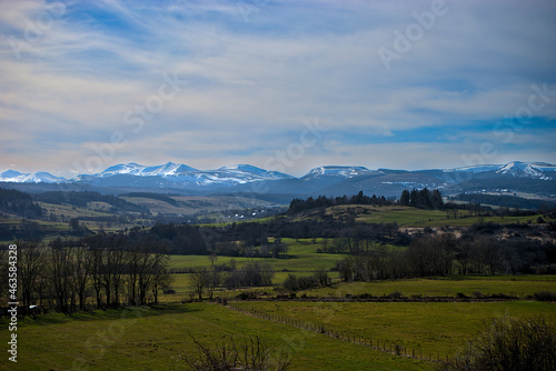 Sancy's mountain chain in spring and view of the pastures. Auvergne, France