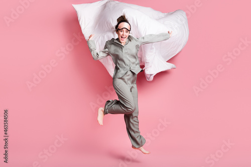 Full body portrait of excited cheerful girl have fun open mouth smile look camera isolated on pink color background