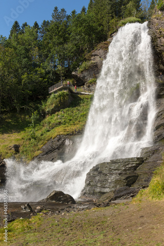 Steinsdalsfossen waterfall and landscape in Norway 