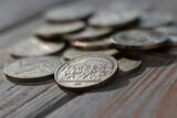 Soviet jubilee rubles on wooden background closeup. Shallow depth of field