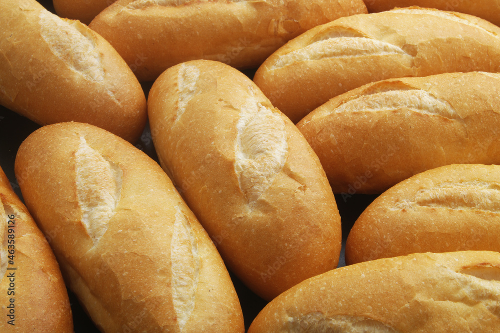 Fresh wheat bread buns close up