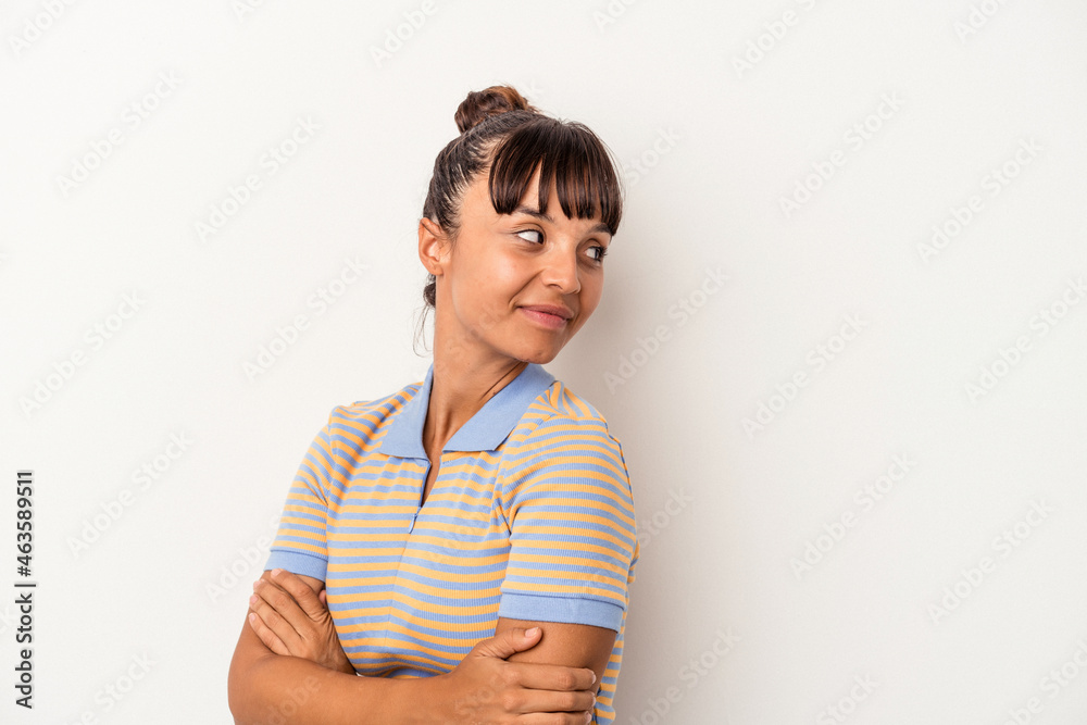 Young mixed race woman isolated on white background laughing and having fun. Young mixed race woman isolated on white background laughing and having fun.