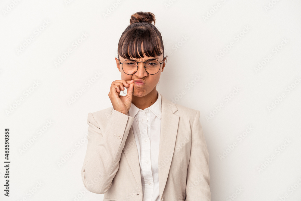 Young mixed race woman isolated on white background with fingers on lips keeping a secret. Young mixed race woman isolated on white background with fingers on lips keeping a secret.