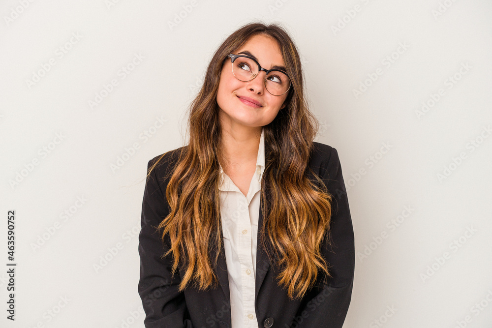 Young caucasian business woman isolated on white background dreaming of achieving goals and purposes Young caucasian business woman isolated on white background dreaming of achieving goals and purposes