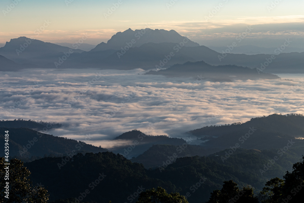 Panoramic view of fog cover mountain range.