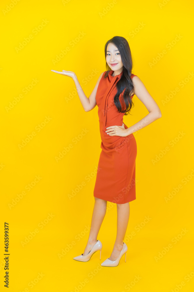 Portrait beautiful young asian woman smile with action Portrait beautiful young asian woman smile with action