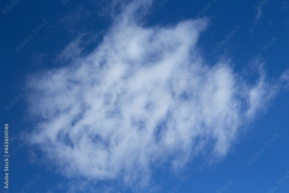 Blue sky background with white clouds around. autumn day Blue sky background with white clouds around. autumn day