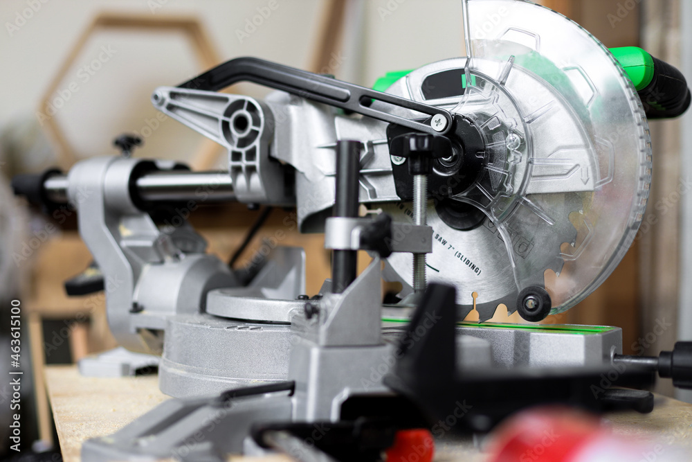 Close up of modern carpenter miter saw Close up of modern carpenter miter saw