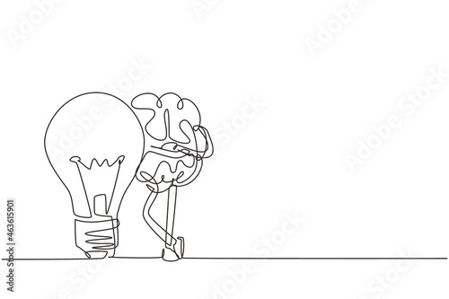 Single one line drawing brain leaning on the light bulb. Symbol of new idea that came to mind. Brain character inspired by the idea soars up. Continuous line draw design graphic vector illustration