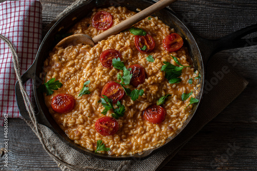 Risotto with Tomatoes, parmesan cheese and roasted Tomato topping